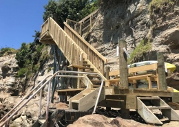 Image of beach staircase overlooking water